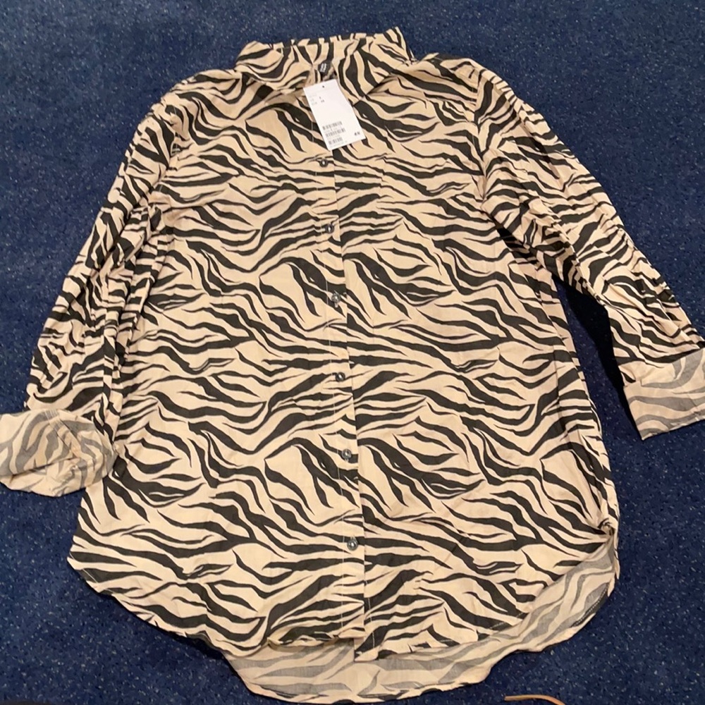 Animal print button down collared shirt.